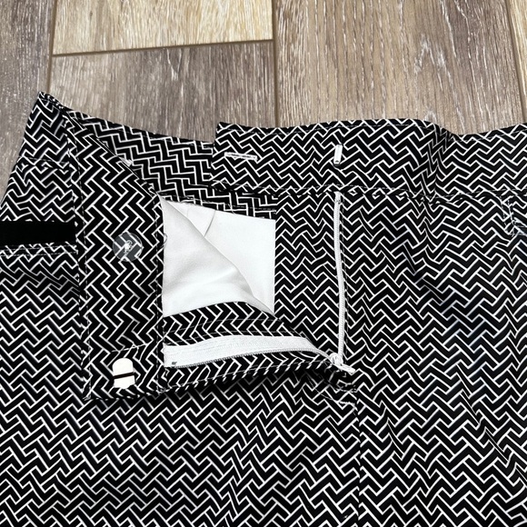 #4) Izod  Golf skort white and black size measurements posted. - Picture 4 of 7